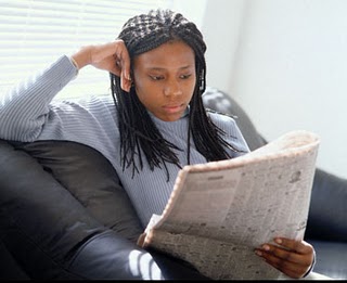 black woman reading